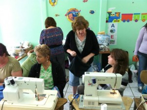 Lynette Austin, employing my (rudimentary) sewing skills in Mission Cosa Rica, 2012