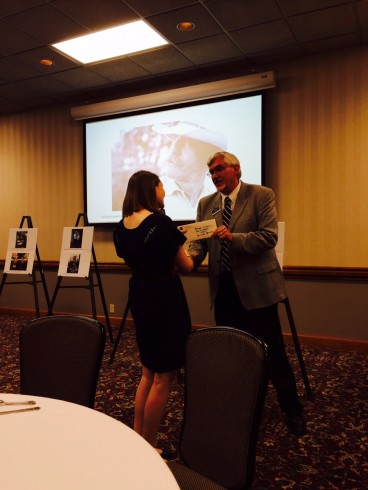 Addie Rich accepting recognition from Dr. Pruett